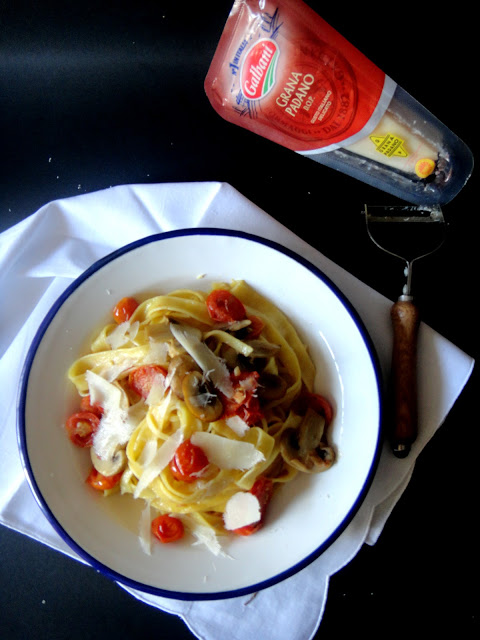Tagliatelle com tomate cherry ,cogumelos e queijo Grana Padano