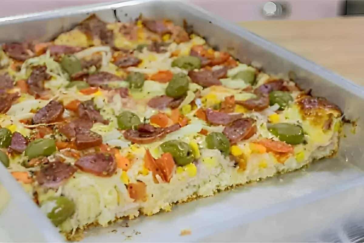 Pizza caseira feita com massa que não precisa sovar muito prática e deliciosa